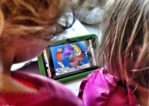 Photo of toddlers with a tablet. Photo by Wayan Vota