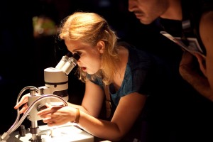 Girl at microscope