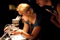 Girl at microscope